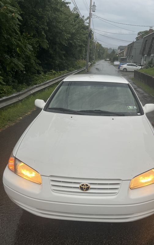 Front view on a wet road after the wash.
