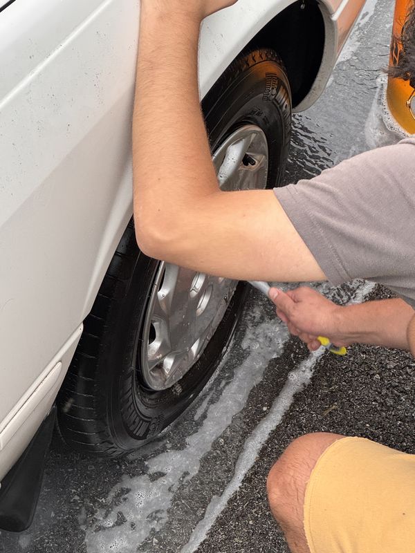Scrubbing a front wheel.