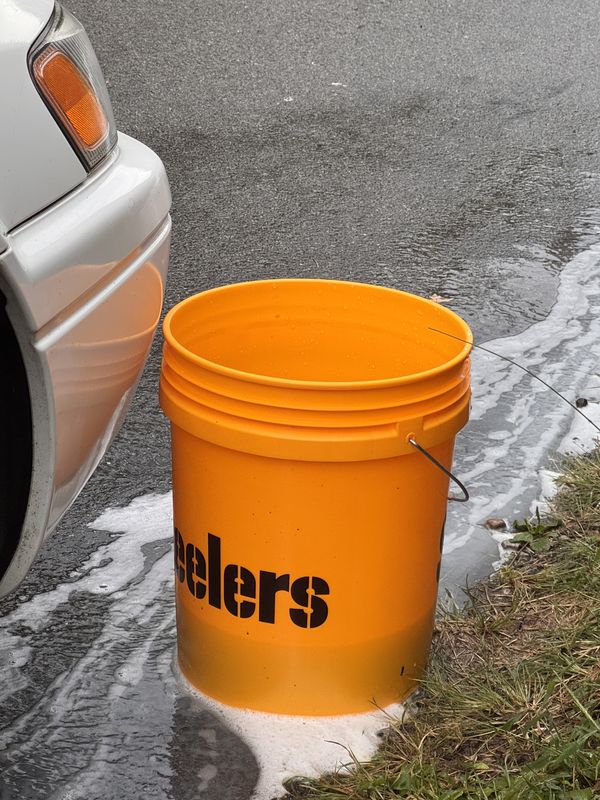Wash bucket next to the front wheel.