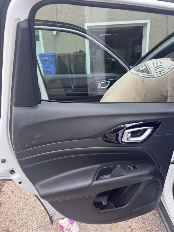Clean Jeep Compass door sill after detailing.