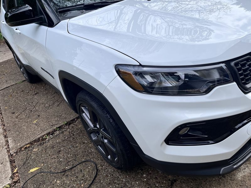 Front fender and headlight, clean and glossy after the wash.