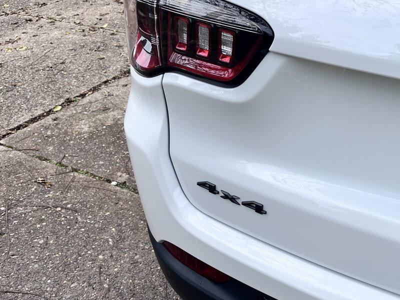 Rear taillight and 4x4 badge after the wash.