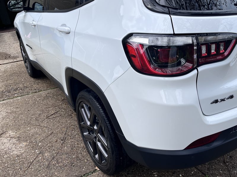 Rear quarter panel, wheel and taillight after the wash.