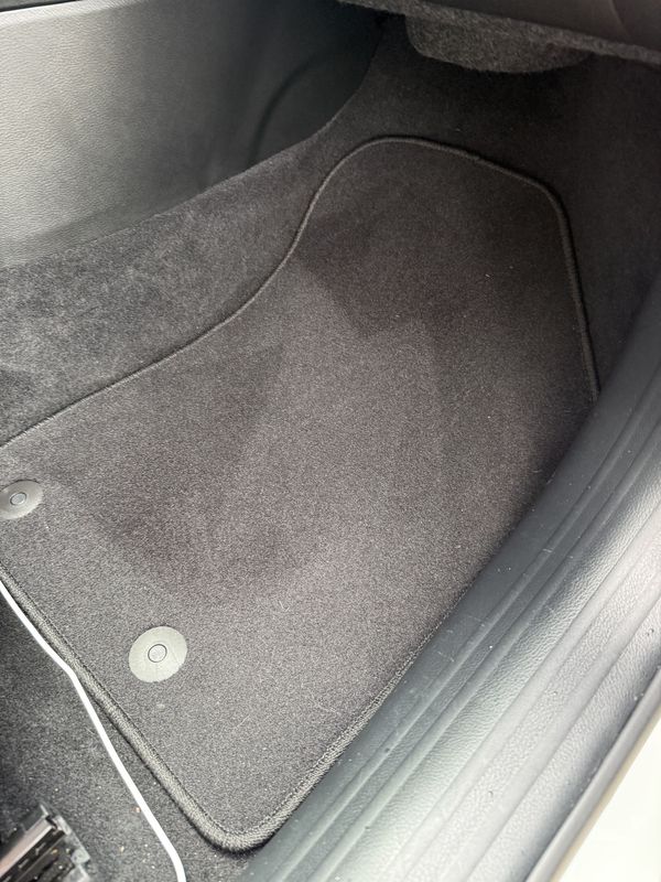 Front floor mat after vacuuming.