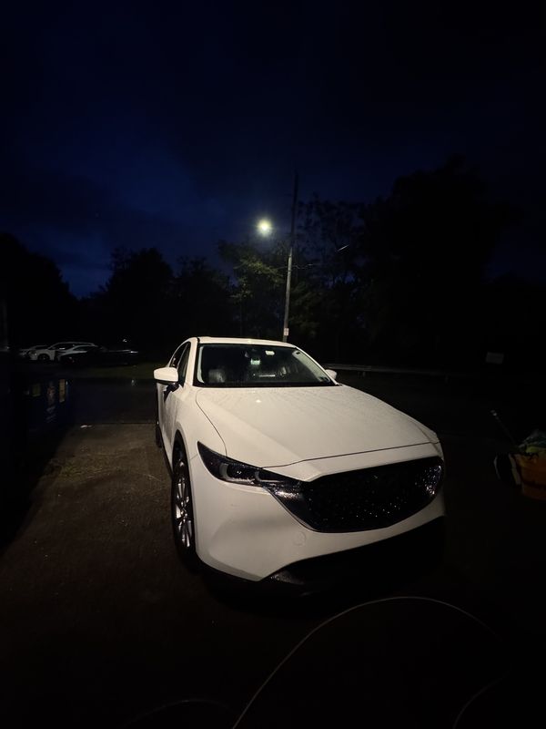 Parked under a streetlight after the wash.